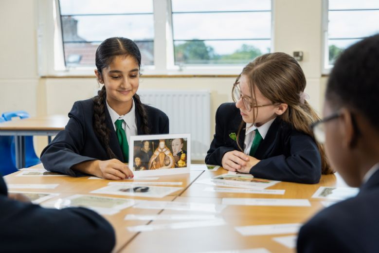 Students in Class looking at a history image